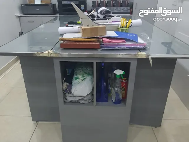 Flexible and adjustable Cutting Table with temper glass with storage & shelves storing.