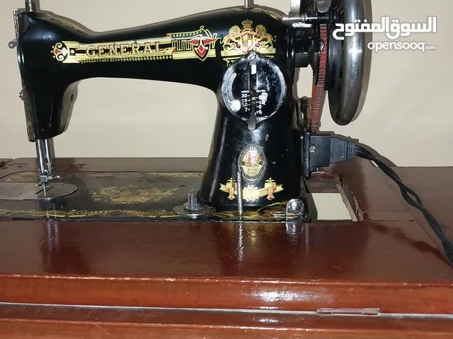مكنة خياطه سنجر