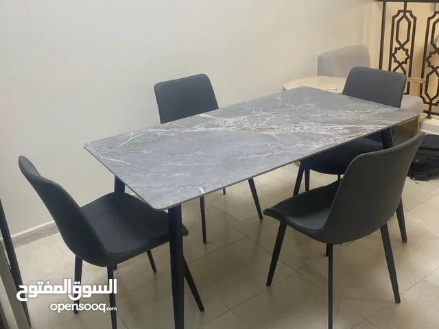 we are selling brand new dining table and chairs
