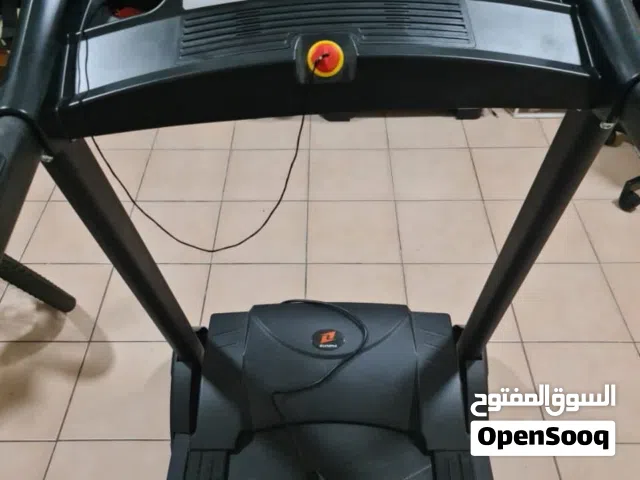 جهاز سير مع الدراجة