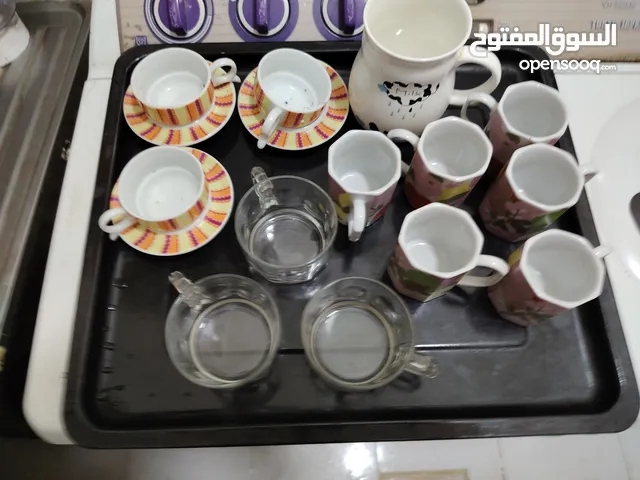 أغراض متعدده 25 قطعه أكواب شاي و أطباق