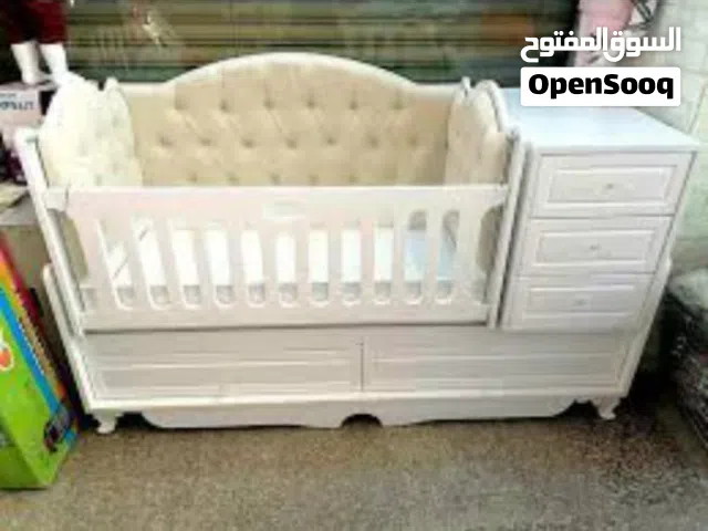 جربايه طفل مع مندرها