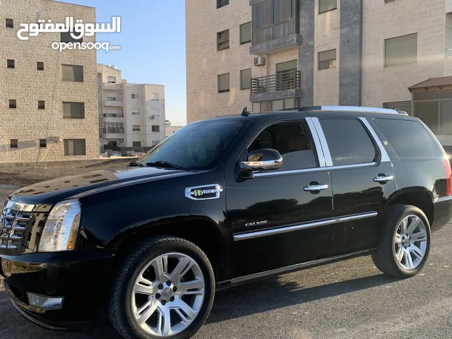 كاديلاك اسكاليد supercharger 2009 hybrid!!!!!