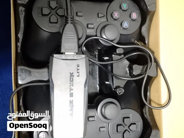 قيم ستك شبه جديد نظيف هلبا استعمال بسيط فيه العاب بلاستيشن ون والعاب اتاري والعاب هلبا قديمة مخلطة