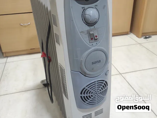 دفايه /صوبه  زيت 11 خانه  أو 11 ريشه مع مروحه توزيع هواء بحاله ممتازه جدا شغاله 100%ب 20 دينار نهائي