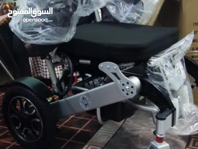 كرسي كهربائي جديد بالكرتون، لم يُستخدم