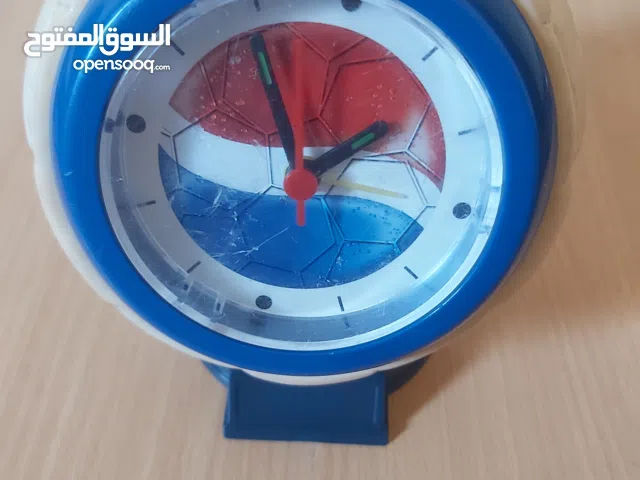 ساعة شكل كرة قدم