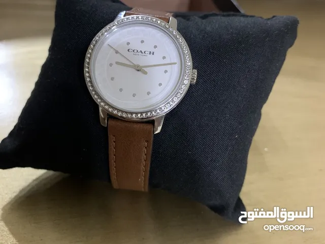 الساعه اصليه مع كودها وع الفحص