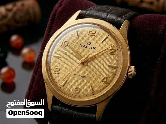 ساعة سويسرية انتيك ماركة ناكار مينا ذهبي فخم شامل الشحن