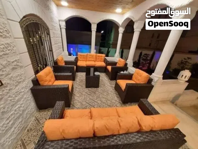 طقم راتان برتقالي فخم 10 مقاعد مع طاولة وسط 290 دينار