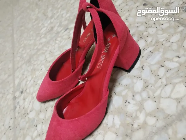 Red With Heels in Baghdad