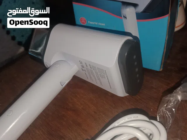 مكواة البخار للملابس