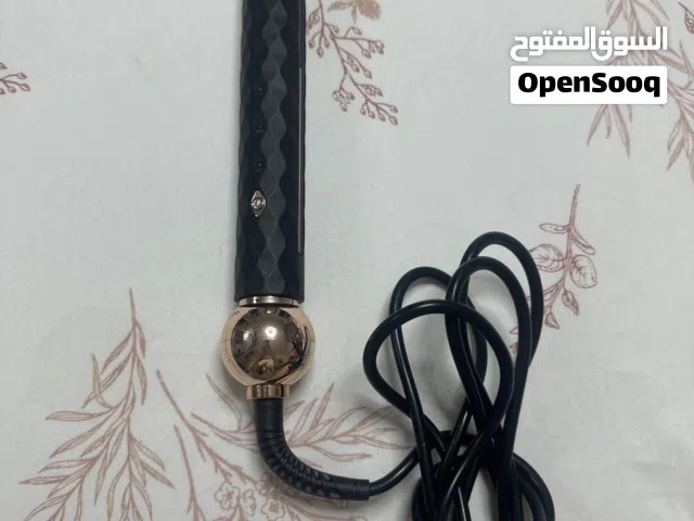 ستريتنر للشعر (مكواة شعر)