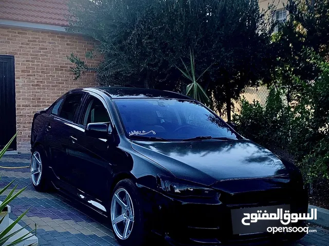 لانسر 2009 ولا اشي ناقصها