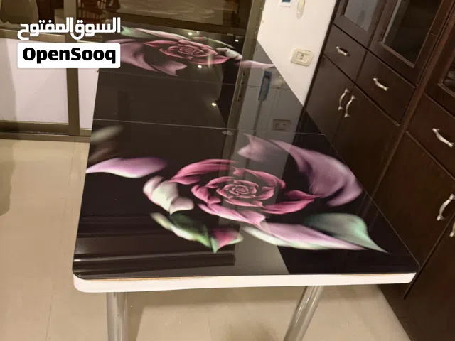 طاوله سفرة زجاج و ألمونيوم للبيع