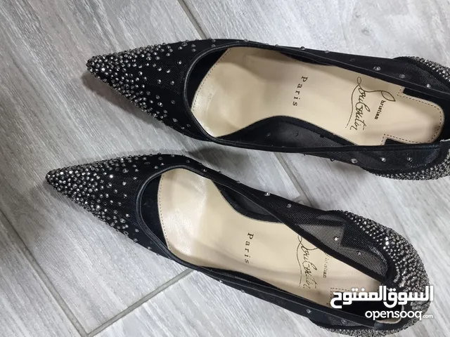 Black With Heels in Amman
