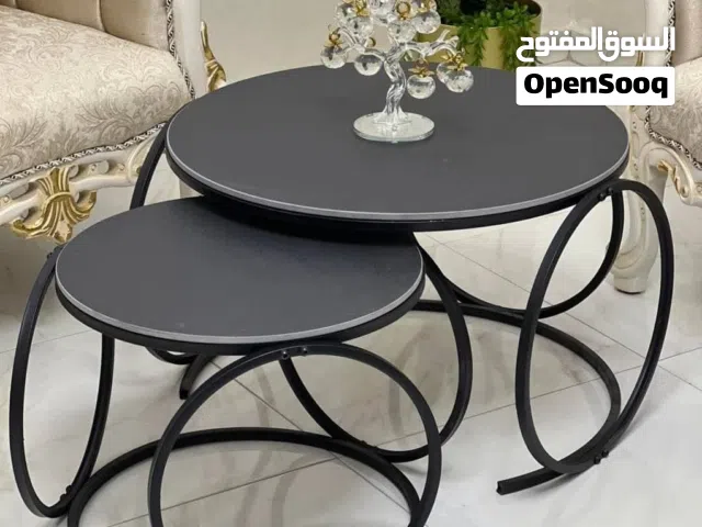 طاولات رخام وزجاج وسط