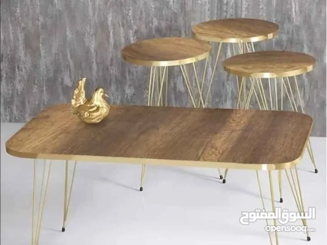 طقم طاولات أحجام متعدد دائري مستطيل الشكل اللون خشبي اطار ذهبي ولون اسود اطار ذهبي