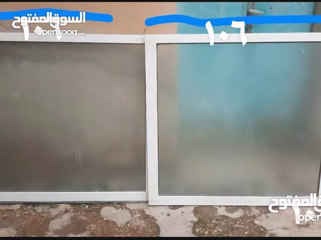 شبابيك ألمنيوم وحديد وأبواب خشب