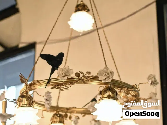 ثريا حلقية فاخرة مع طيور ديكورية