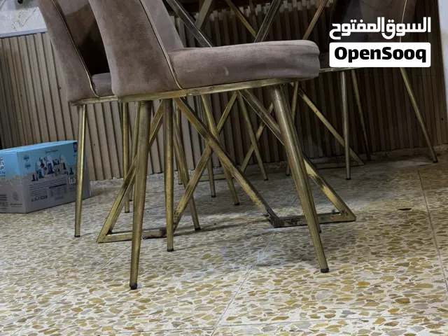 ميز ابو ال 6 كراسي باقي بي بس 4 كراسي