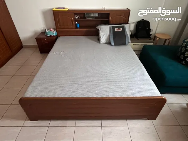 3pc Bedroom set for Sale (includes Bed with storage wardrobe and a side table)