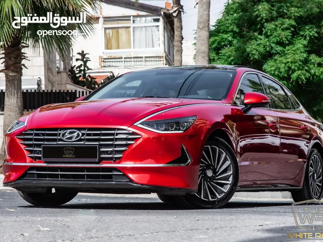 Hyundai Sonata 2021 Hybrid السيارة وارد و صيانة الشركة و قطعت مسافة 125,000 كم فقط