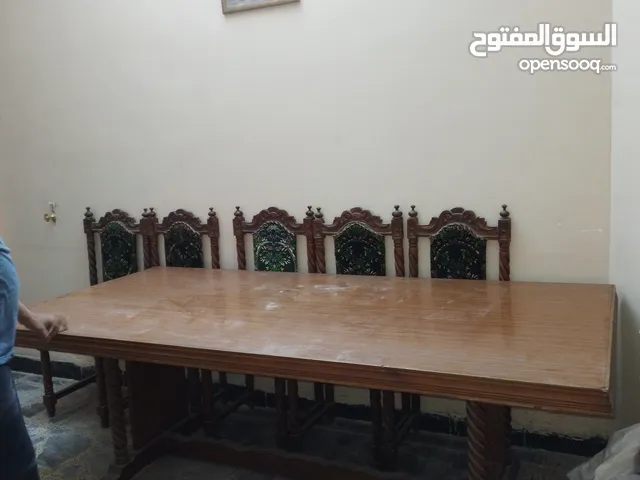 ميز طعام مع 8كراسي خشب اصلي