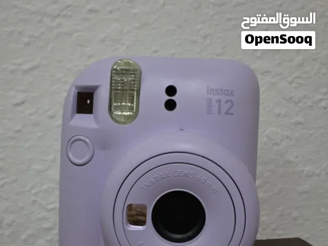 Instax Mini 12 Camera – Like New + Case + Photo Album