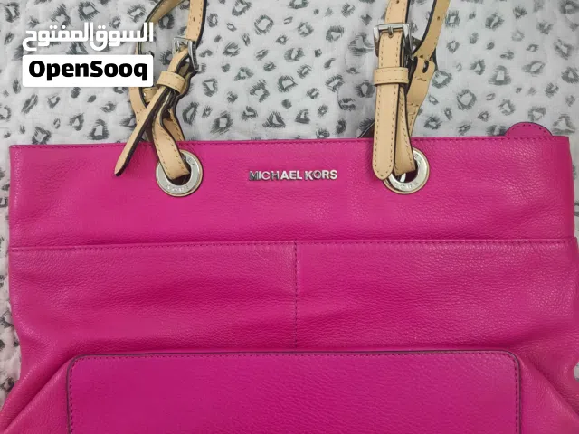 original michael kors  color pink for sale