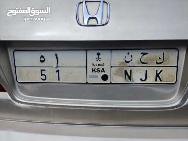 NJK 51 car number plate
