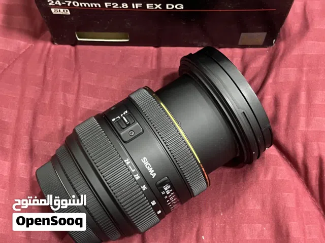 عدسة Sigma 24-70mm f/2.8 لكاميرات كانون مع الكرتون