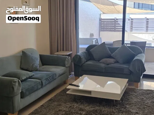 شقة أرضية مع حديقه وترس  مفروشة للإيجار في عبدون جديدة بأثاث فاخر وموقع مميز ومخدوم