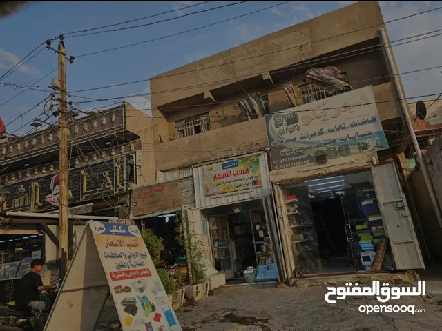 بناية تجارية موقع مميز بغداد..  بغداد الجديدة شارع المسبح مجاور مطعم اغا الشام م211 وجهه 10