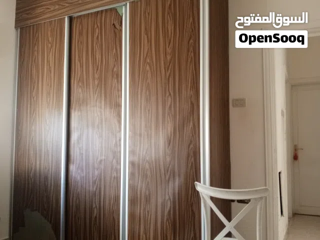 خزانة حائط و تخت مفرد