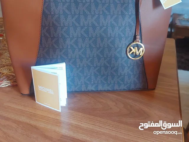 شنتة جديدة ستاتي ماركة MICHAEL KORS اصلية وارد اميركا لون بني فاتح