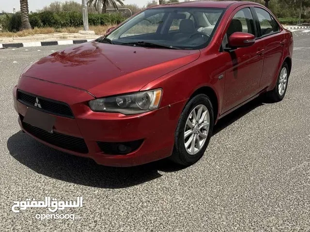 لانسر EX خالية 2015 محرك 2000 بسعر 8000 دولار و بازار بحالة ممتازة