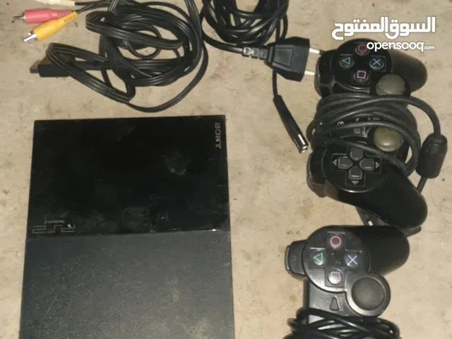 Playstation 2 with pads and wires