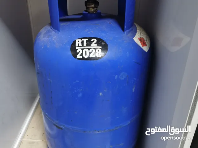Adnoc gas cylinder with adapter for sale in Ajman اسطوانه غاز ادنوك للبيع في عجمان