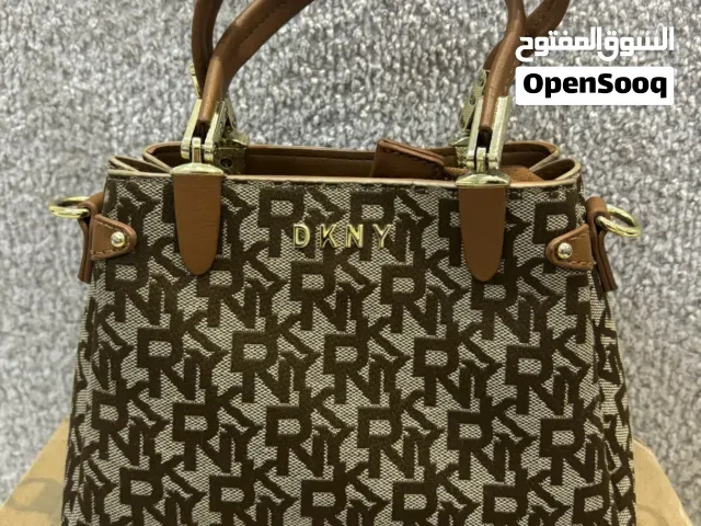 Orange DKNY for sale  in Al Riyadh