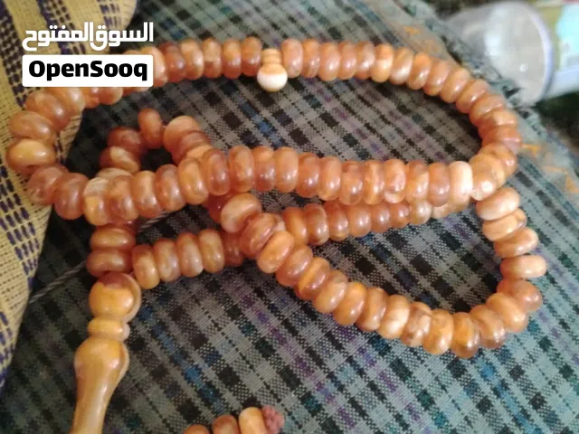 مسبحه كهرمان للبيع عدد تسعه وتسعين حبه واربع احتياط