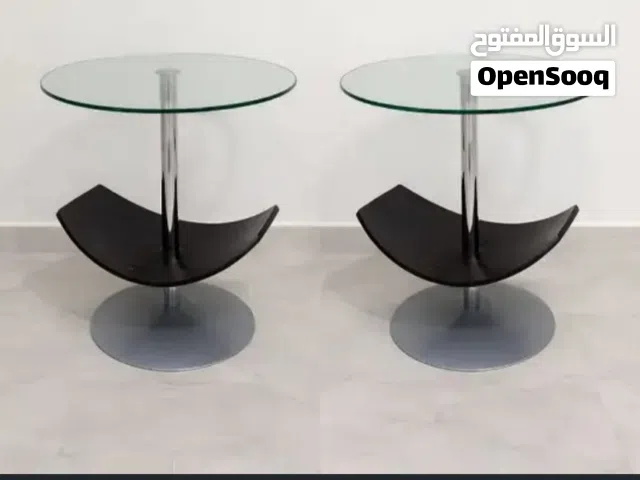 2 glass-top accent table with metal pedestal base