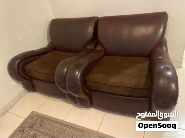 كنب جلد قطعتين