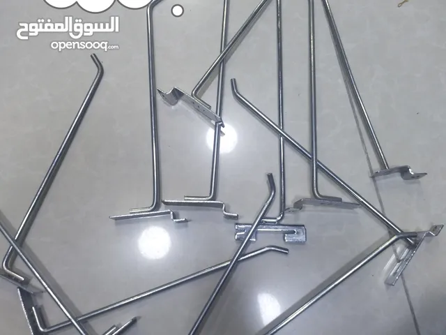 علاقة ملابس مع هوكات تعليق ملابس مع ستاندات بحال الوكالة للاتصال