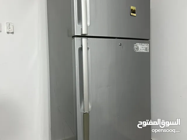 ثلاجة و فريزر بحالة ممتازه