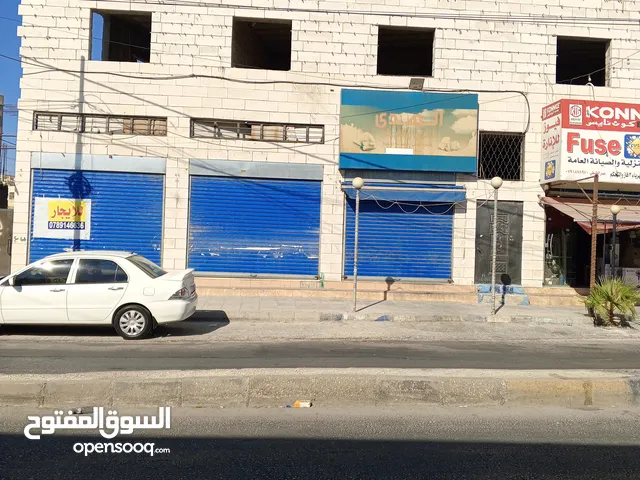 محل للايجار في وادي الحجر على الشارع الرئيسي
