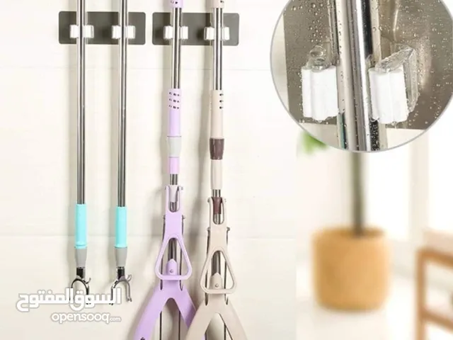 حامل المكانس والمساحات مزدوج على الحائط - بـ1000 ريال