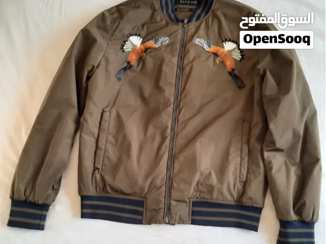 جاكيت بومبر زيتي من زارا