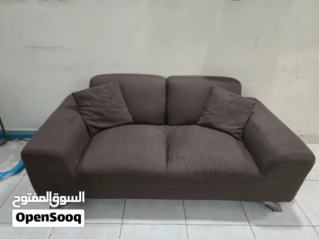 2 seater brown sofa