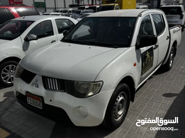 فرصة جيدة ميتسوبيشي بيك أب دبل كابينة 2009 بحالة ممتازة جدا